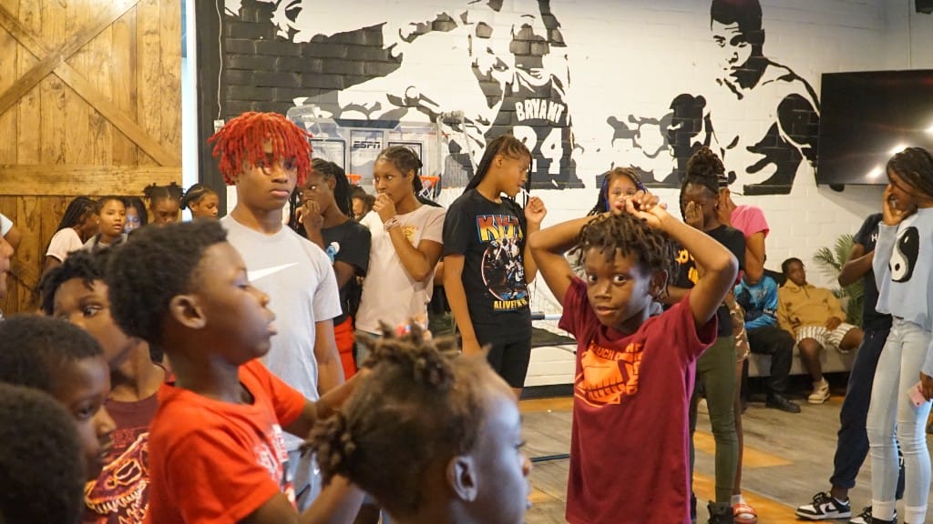 Young people participating in a youth event gathering.