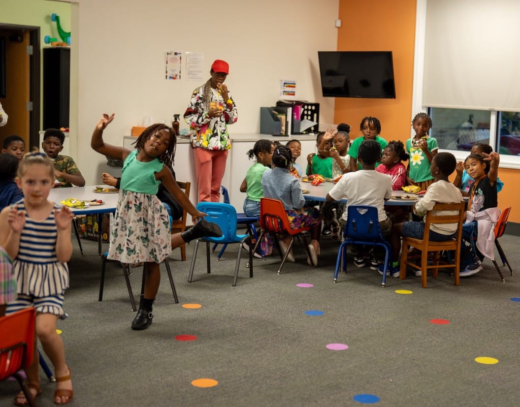 Children enjoying class activities in a Chosen Kids room.
